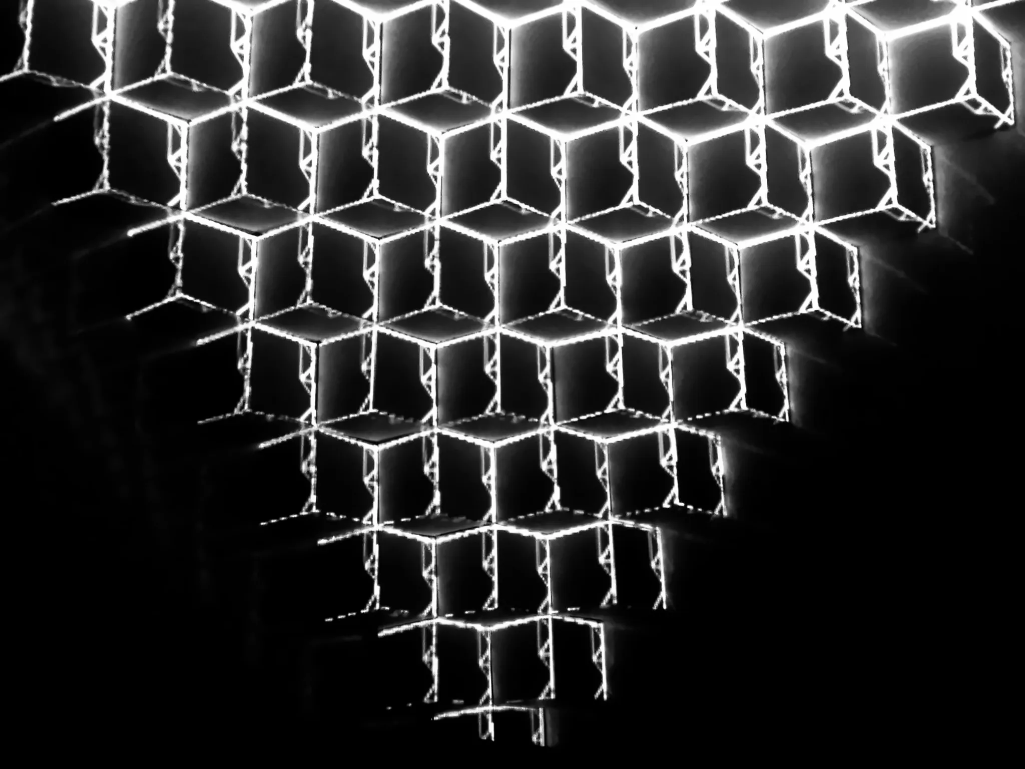 Wall installation of white geometric light modules
